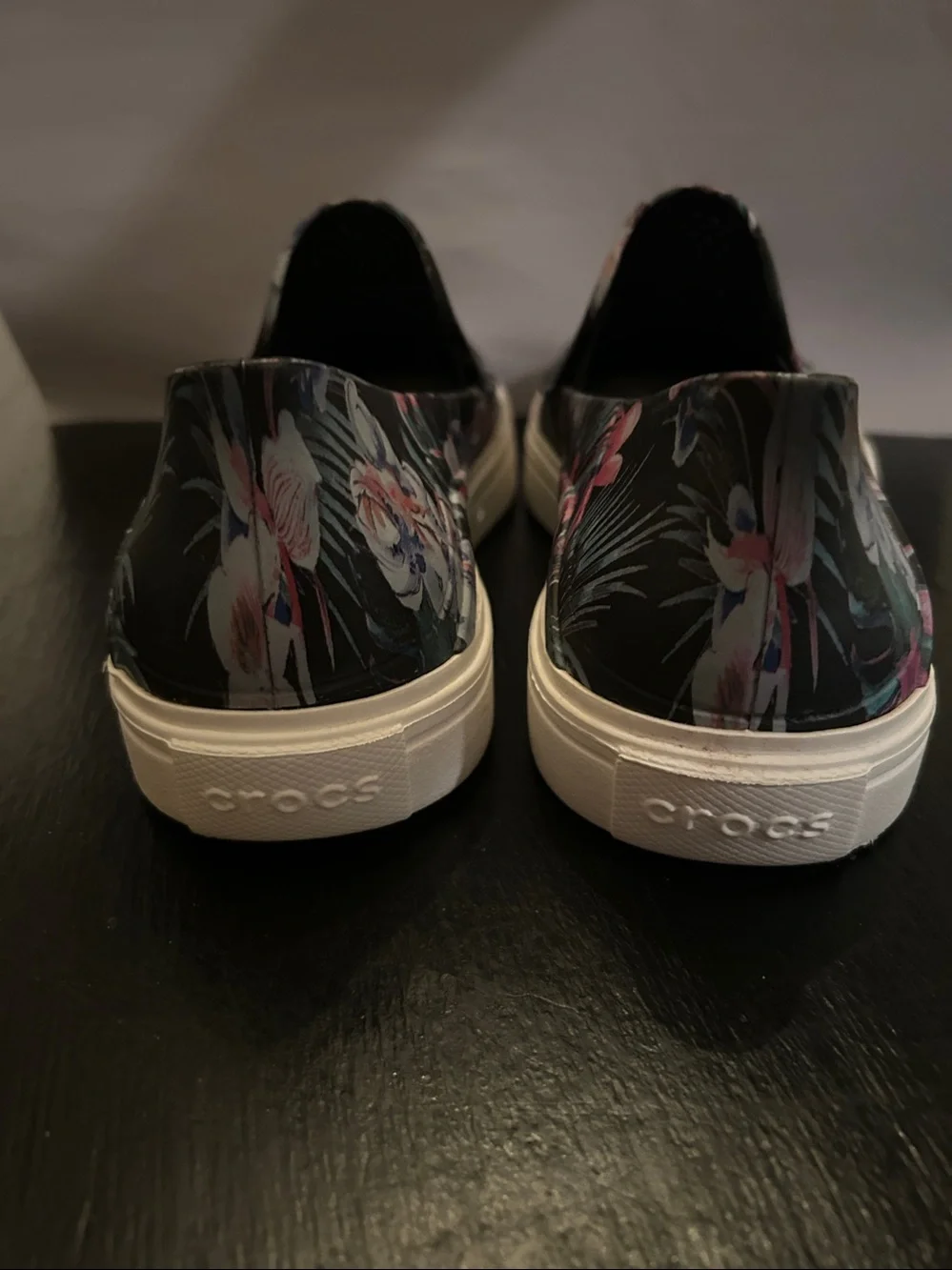 CROCS Black Floral Slip-On Flats with Pink & Blue Accents